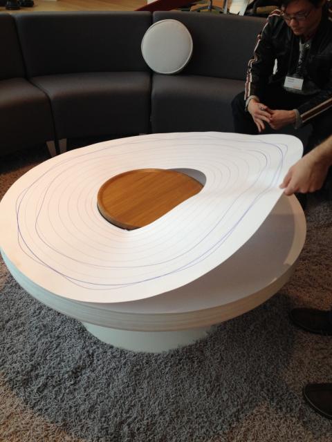 Take your notes and doodles with you on this rotating sketch pad table at SteelCase.